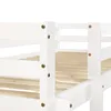 A close-up view of the white wooden structure of a bunk bed, showing the joinery and wooden slats of the bed base. Voir les images du produit