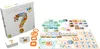 A board game box and its components are laid out on a white surface. Produktbild-Vorschau