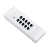 A white remote control with black buttons is shown against a white background. Anteprima dell’immagine prodotto