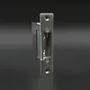 A close-up studio shot of a metal door lock mechanism against a dark background. Produktbild-Vorschau