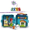 A LEGO Friends Mia's Soccer Cube playset is shown open, displaying its interior play areas and accessories, along with mini-figures and toy puppies. Produktbild-Vorschau