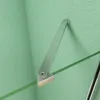 A close-up view of a shower enclosure stabilizer arm attached to a textured green wall and a glass panel. Produktbild-Vorschau