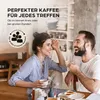 A happy couple is enjoying coffee together at a table. Produktbild-Vorschau
