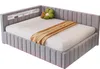 A bed with a mattress, blanket, and decorative pillows, set against a white background. Náhled obrázku produktu