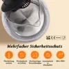 Close-up view of the top of a glass electric kettle with a black lid, showing internal components and safety feature icons below. Produktbild-Vorschau