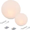 Two illuminated spherical garden lights of different sizes are shown on a white background, along with their accessories. Produktbild-Vorschau