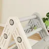 Close-up view of a children's climbing structure, showing the connection points and bars. Produktbild-Vorschau