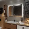 A modern bathroom with a sink, mirror, and washing machine. Produktbild-Vorschau