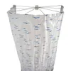 A shower curtain with a bird pattern hanging from a shower rod. Produktbild-Vorschau