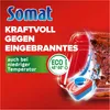 A close-up marketing image of Somat dishwasher tabs against a red background, highlighting their effectiveness against burnt-on food and low-temperature cleaning. Produktbild-Vorschau