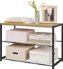 A three-tier shoe rack with books, boxes, and flowers displayed on it. Produktbild-Vorschau