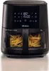 A black air fryer with french fries inside, displayed on a white background. Náhled obrázku produktu