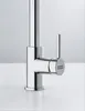 A close-up shot of a chrome faucet on a white surface. Podgląd zdjęcia produktu