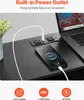 A desk surface with a built-in power outlet, charging a laptop and a smartphone. Náhľad obrázku produktu
