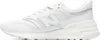 A side view of a white New Balance sneaker. Podgląd zdjęcia produktu