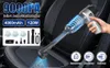 A hand holding a cordless vacuum cleaner being used to clean a car seat. Produktbild-Vorschau