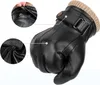 Close-up view of a black leather glove with tan knitted cuff, showing details of the material and closure. Produktbild-Vorschau