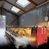 Chicks in a coop with a heater. Náhled obrázku produktu