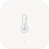 A white square device with a thermometer icon in the center. Voir les images du produit