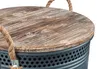 A close-up view of the top of a round storage basket, showing the wooden lid and the perforated metal side. Produktbild-Vorschau