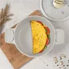 An omelette is being cooked in a pot on a countertop. Náhľad obrázku produktu