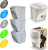 A set of three white stacking trash bins with recycling labels on the side, shown in a studio setting. Voir les images du produit