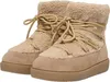 A pair of beige winter boots. Produktbild-Vorschau