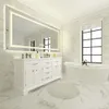 A modern bathroom with a large illuminated mirror, a white vanity, and a freestanding bathtub. Produktbild-Vorschau
