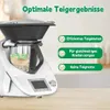 A white kitchen appliance with a black bowl attachment, showing dough inside and text overlays highlighting its features. Produktbild-Vorschau