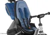 Close-up of a child's tricycle seat and handlebars. Produktbild-Vorschau