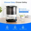 A glass water filter pitcher with a glass of filtered water on a wooden table, with promotional text and icons overlaid. Náhled obrázku produktu