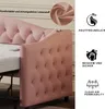 A close-up view of a pink upholstered sofa bed with tufted details and a USB port, accompanied by marketing icons and text. Produktbild-Vorschau