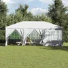 A white party tent set up on a grassy lawn with trees in the background. Podgląd zdjęcia produktu