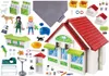A collection of Playmobil veterinary clinic toys, including figures, animals, and building pieces, arranged on a white background. Produktbild-Vorschau