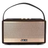 A studio shot of a portable speaker. Voir les images du produit