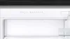 Close-up view of the interior control panel and shelves of a white refrigerator. Produktbild-Vorschau