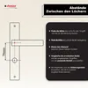 Diagram showing how to measure the distance between holes for a door handle, with instructions in German. Produktbild-Vorschau