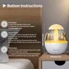 A humidifier with a mushroom-shaped light and water droplets, placed on a nightstand next to a bed. The image includes instructions on how to use the buttons. Produktbild-Vorschau