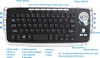 A top-down view of a wireless keyboard with a trackball and scroll wheel, featuring callouts and labels. Produktbild-Vorschau