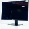 A black computer monitor on a white stand and base, set against a white background. Produktbild-Vorschau