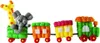 A toy train made of colorful building blocks, with a giraffe and an elephant as passengers. Produktbild-Vorschau