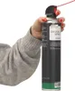 A hand holding a can of compressed air spray. Produktbild-Vorschau