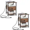 Two identical nightstands are shown against a white background, each with a power cord plugged in. Produktbild-Vorschau
