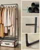 A collage of images showing a black garment rack with clothes hanging on it, details of the product's construction, and a vintage-style suitcase. Náhled obrázku produktu