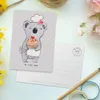 Mr. & Mrs. Panda Postkarte Konditorin Herz - Grau Pastell - Produktbild-Vorschau 3