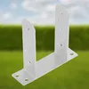 A metal U-shaped post bracket is shown against a blurred background of green grass and a blue sky. Náhľad obrázku produktu