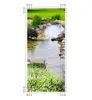 A wall sticker with a high-gloss laminate finish, designed to look like glass, featuring a scenic image of a garden pond with flowers and a stream. Produktbild-Vorschau