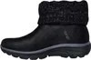 A side view of a black Skechers boot with a knitted cuff. Voir les images du produit
