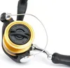 A close-up shot of a fishing reel on a white background. Produktbild-Vorschau