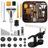 A collection of watch repair tools laid out on a white background, with a brown case containing some of the tools. Náhled obrázku produktu